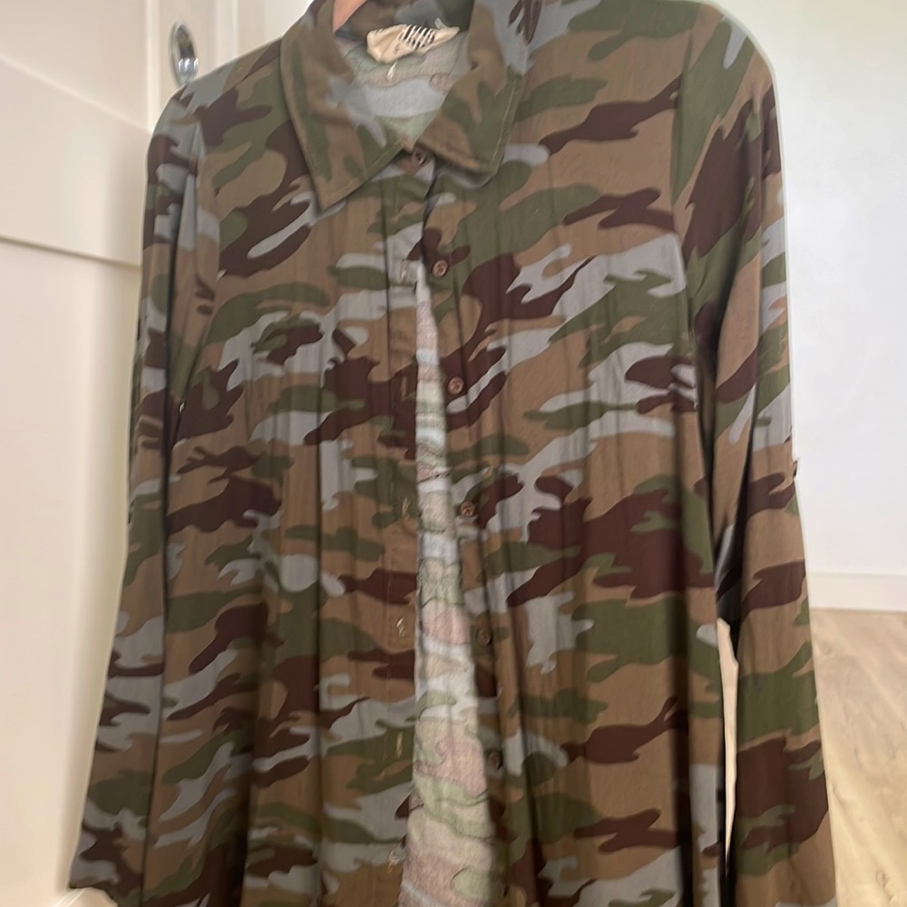 Camouflage Button Down Polo. Embroidery design on back.